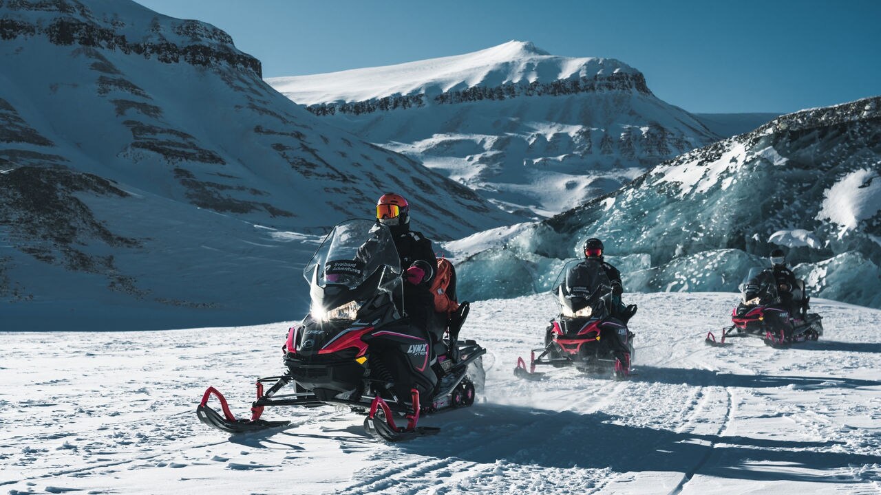 Lynx snowmobile riding along ice caves