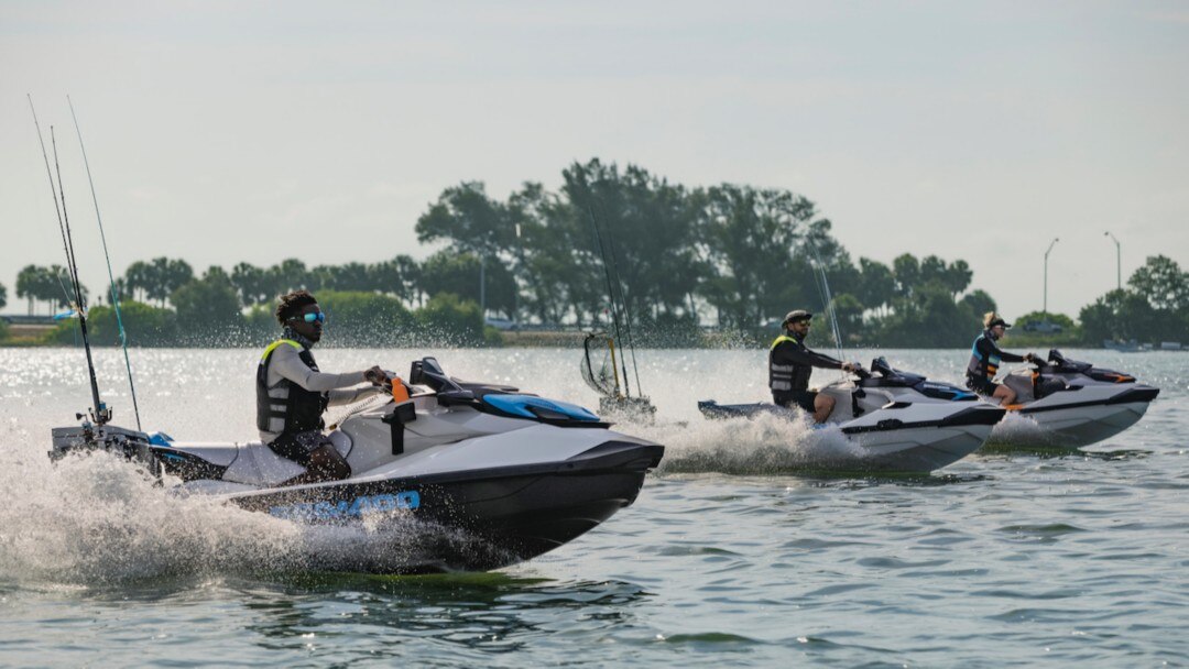 Two friends each driving Sea-Doo FishPro