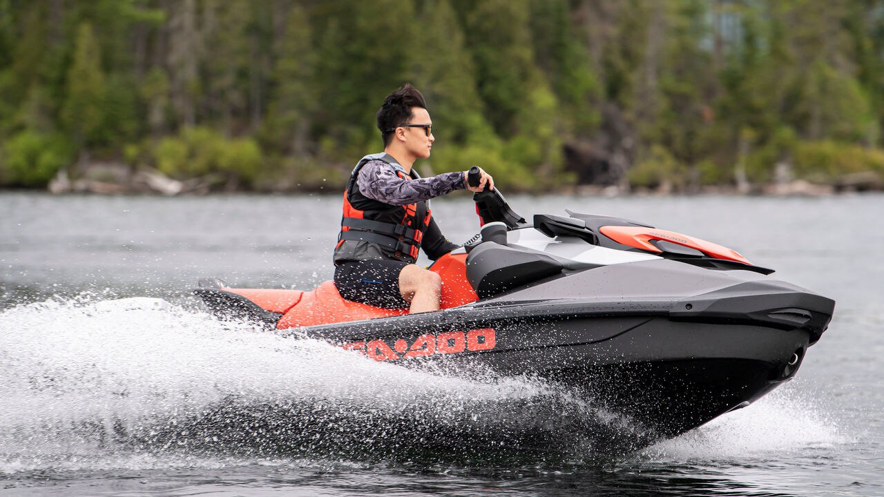 A man riding Sea-Doo on water