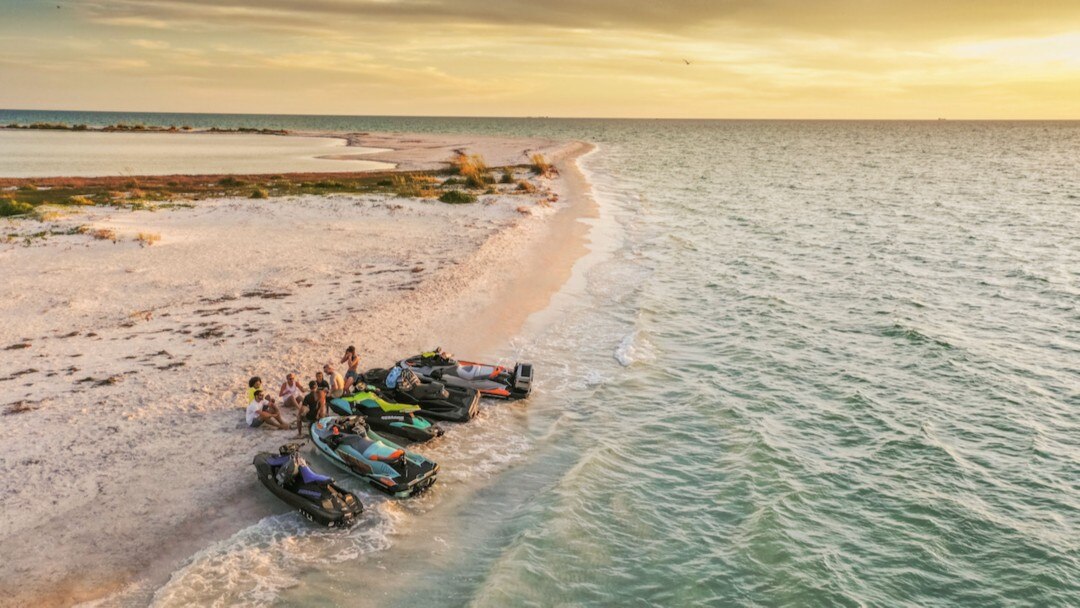 group of Sea-Doo on a beach