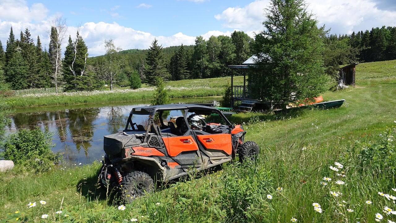 Can-Am next to a pond