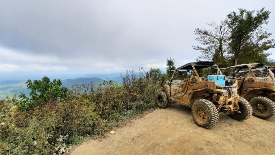 Can-Am vehicles looking over a valley