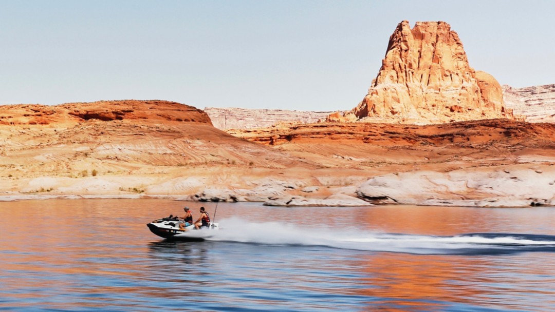 two fishers riding on a Sea-Doo