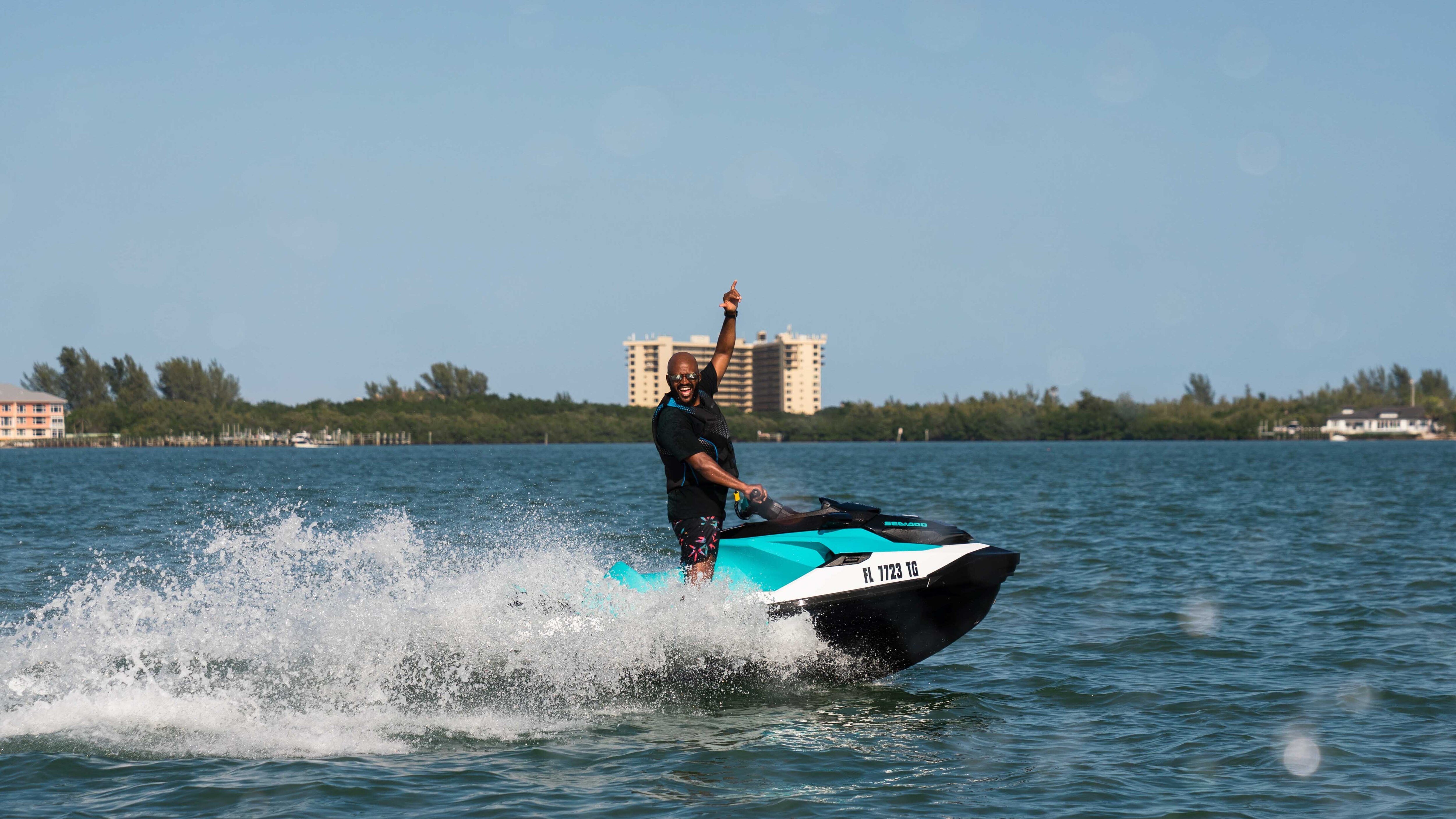 Selema Masekela riding a Sea-Doo 