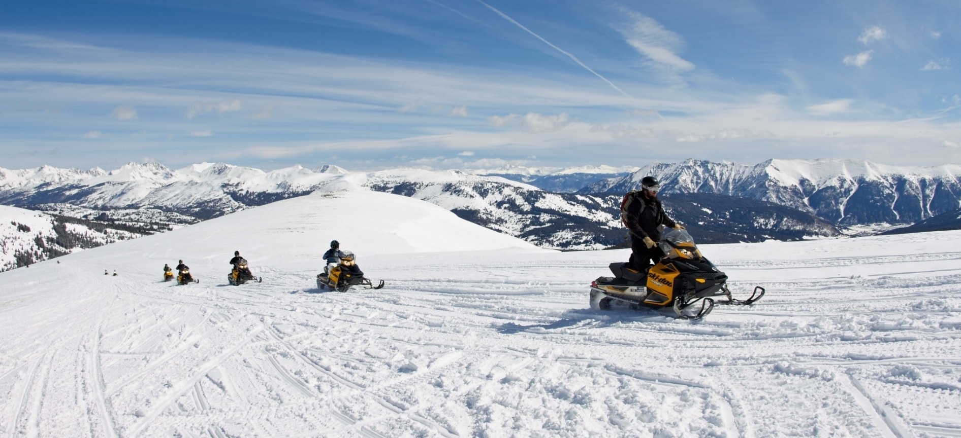 Group on Ski-Doo on the top of the mountain