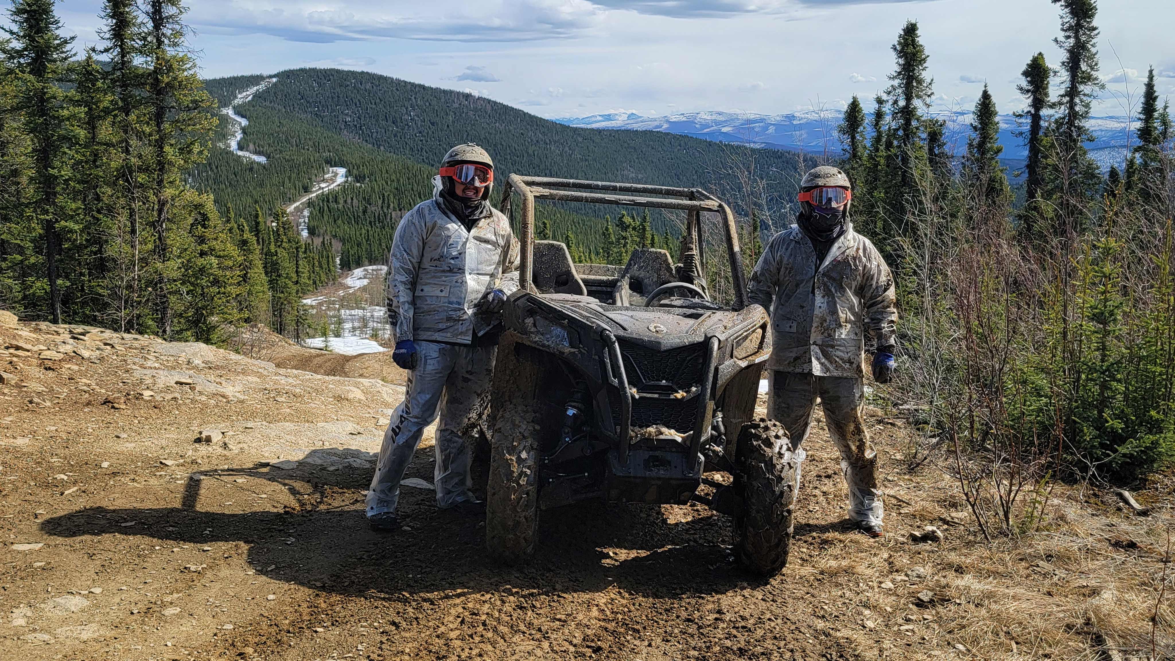 Frontal view of two men and Can-Am SSV