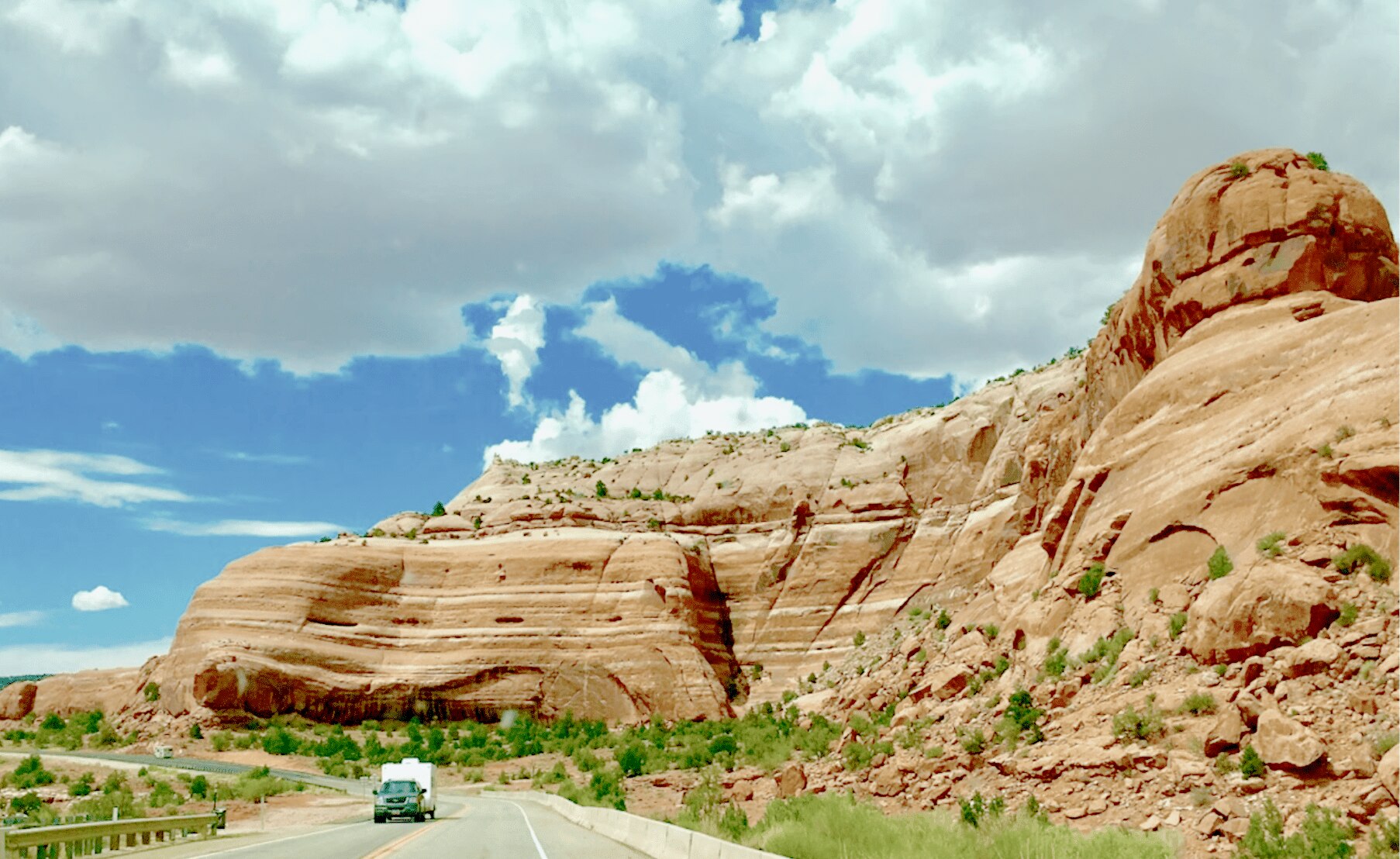Truck pulling an RV in Moab Desert