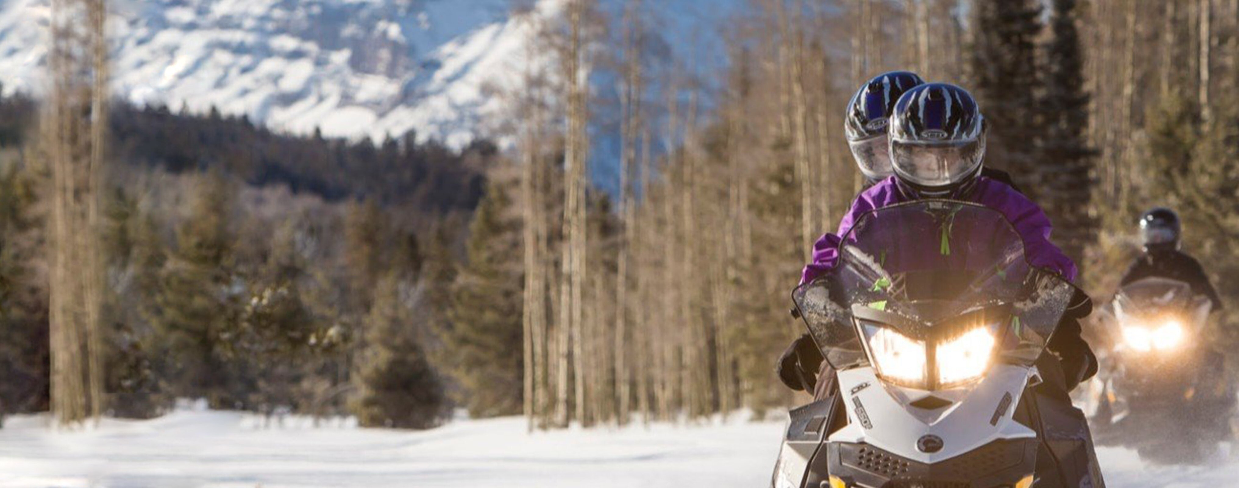 Front view of Ski-Doo riders driving