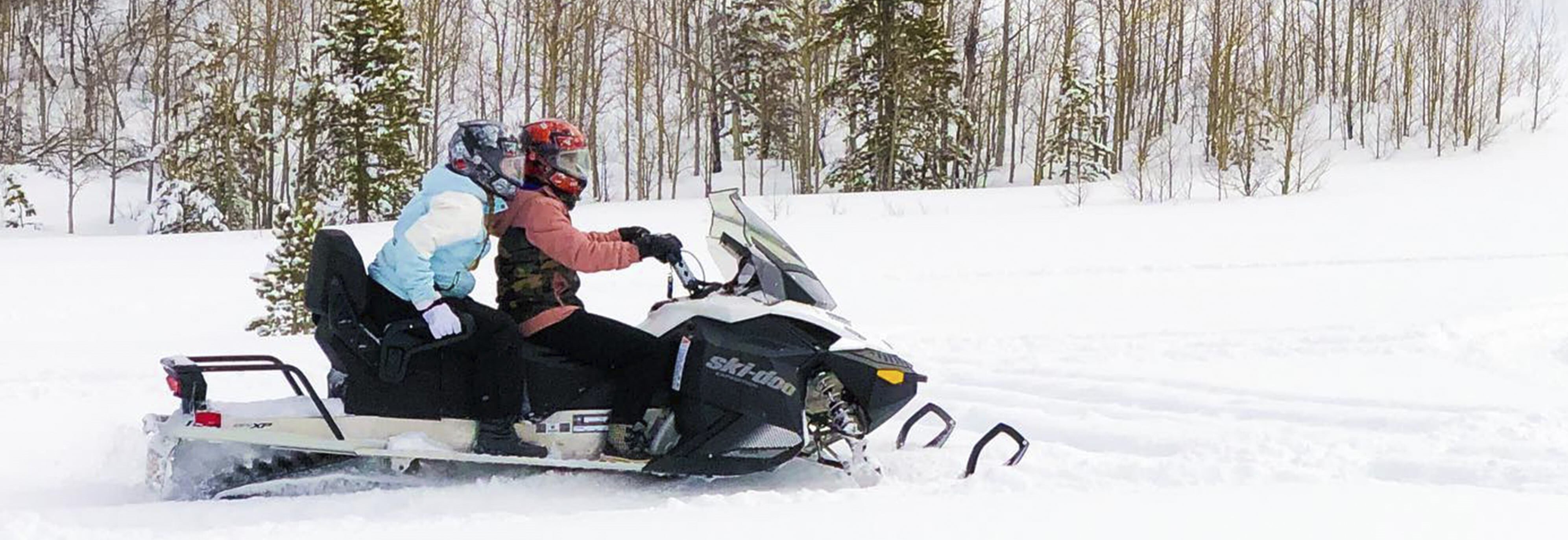 Ski-Doo riders on their sled driving by
