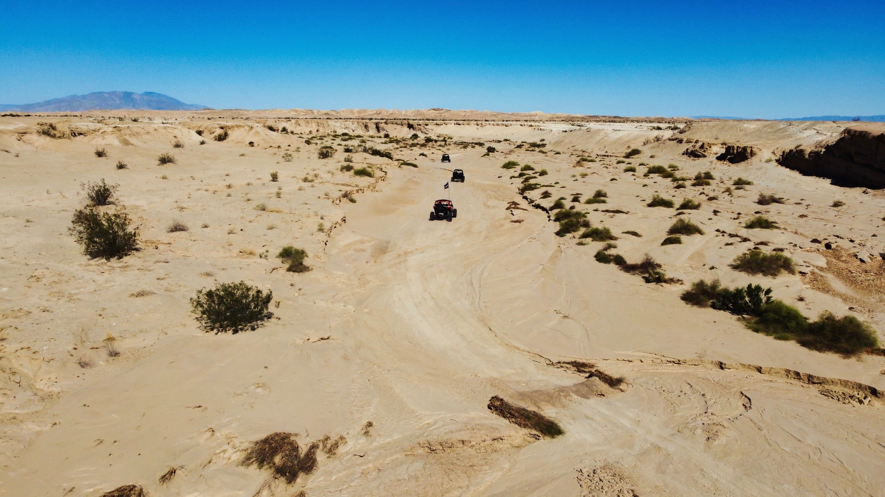 Bird's eye view of in the desert with SSV's