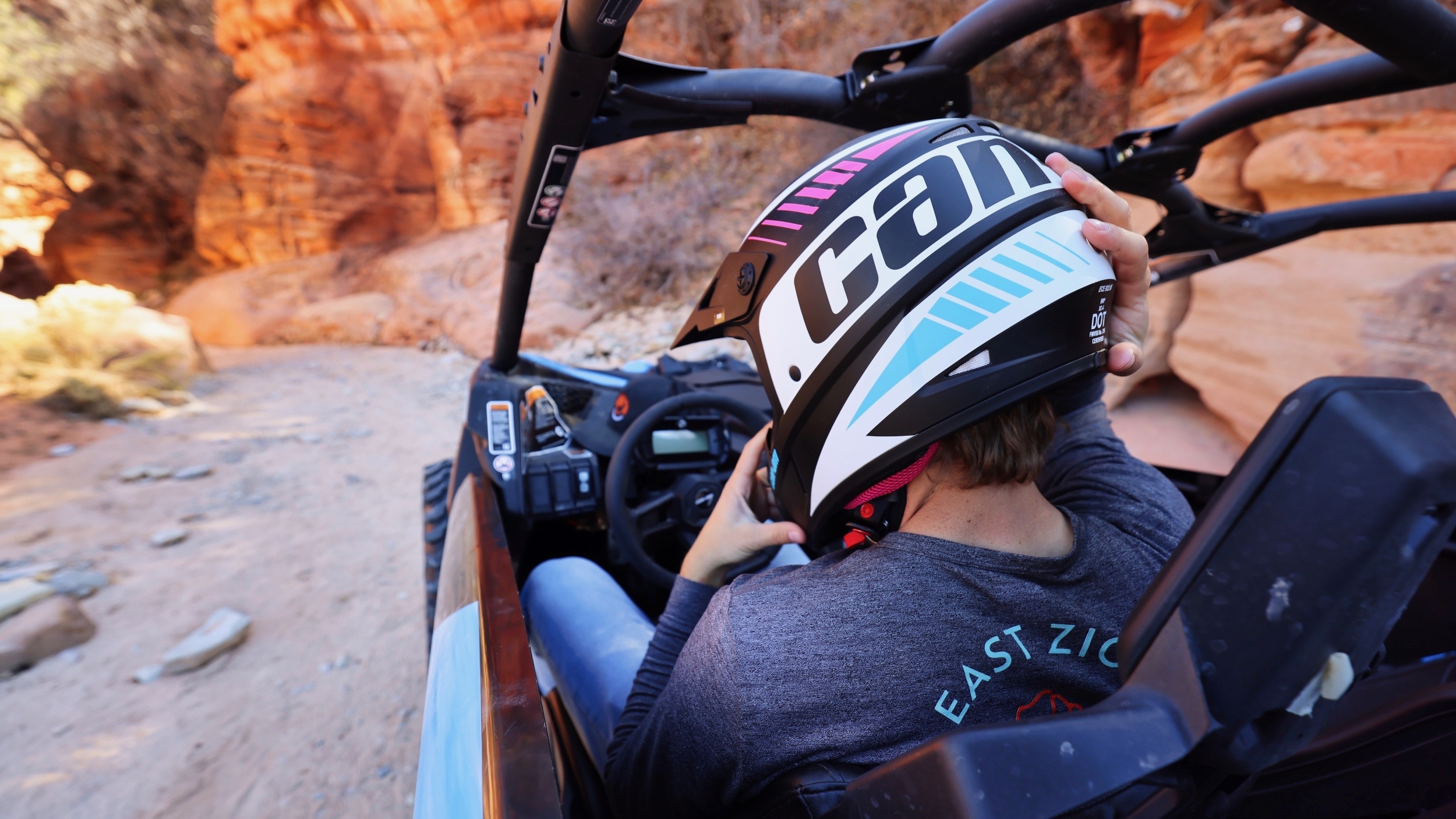 Man putting an helmet on in SSV