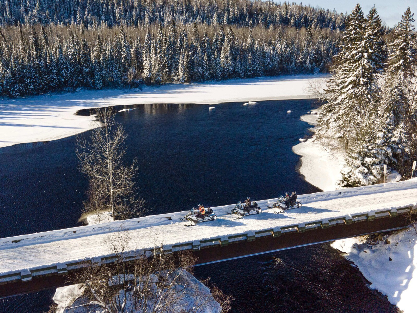 Snowshoeing and snowmobiling in Saint-Michel-des-Saints, QC