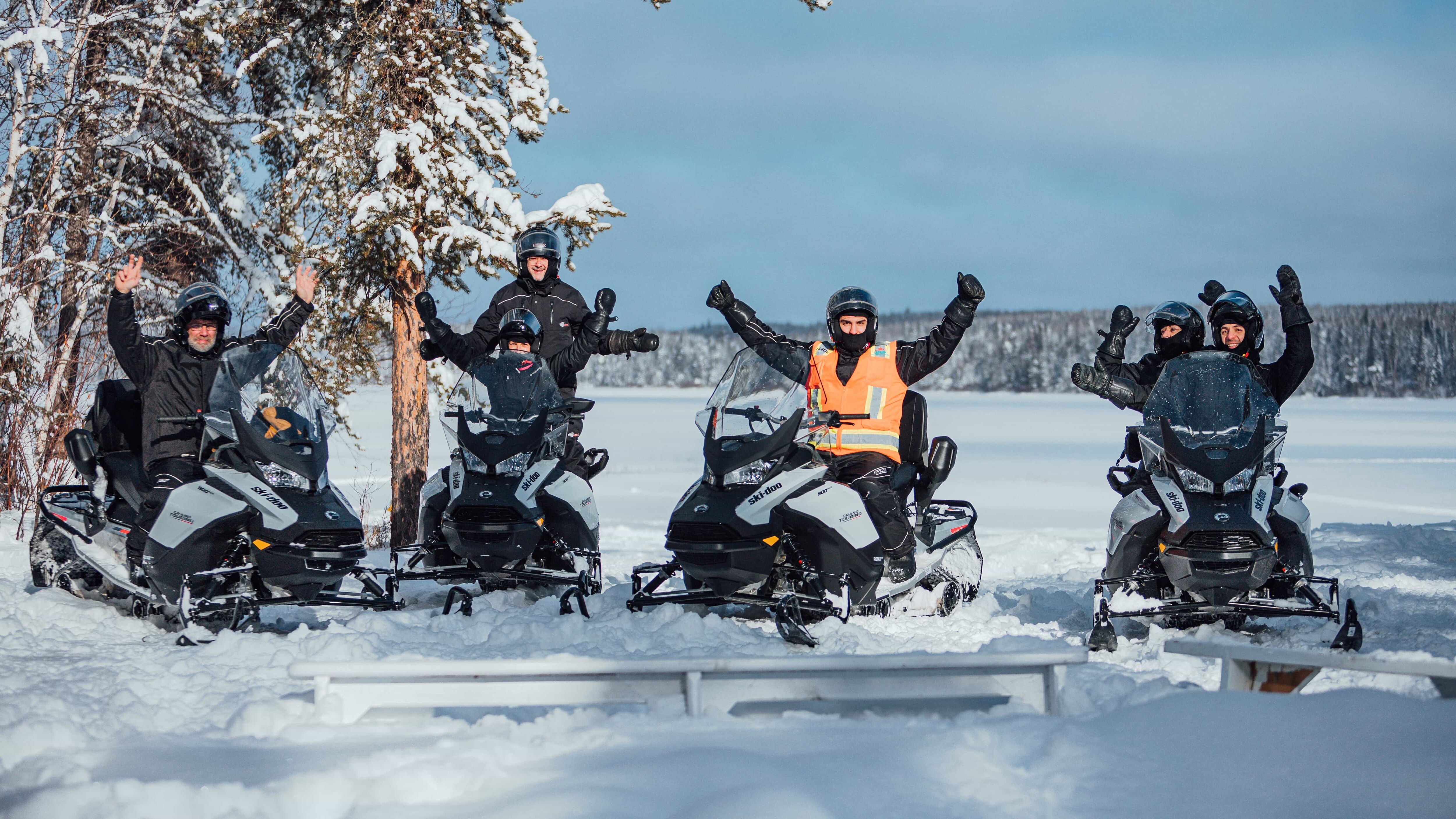 A group of happy riders on their Ski-Doo