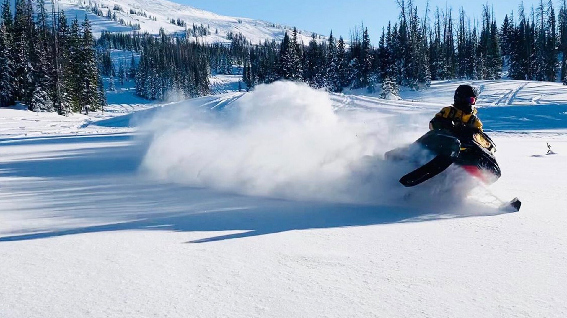 A Ski-Doo rider turning aggressively