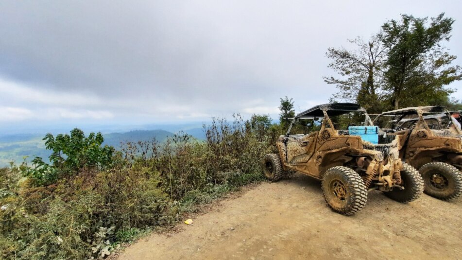 Can-Am vehicles looking over a valley