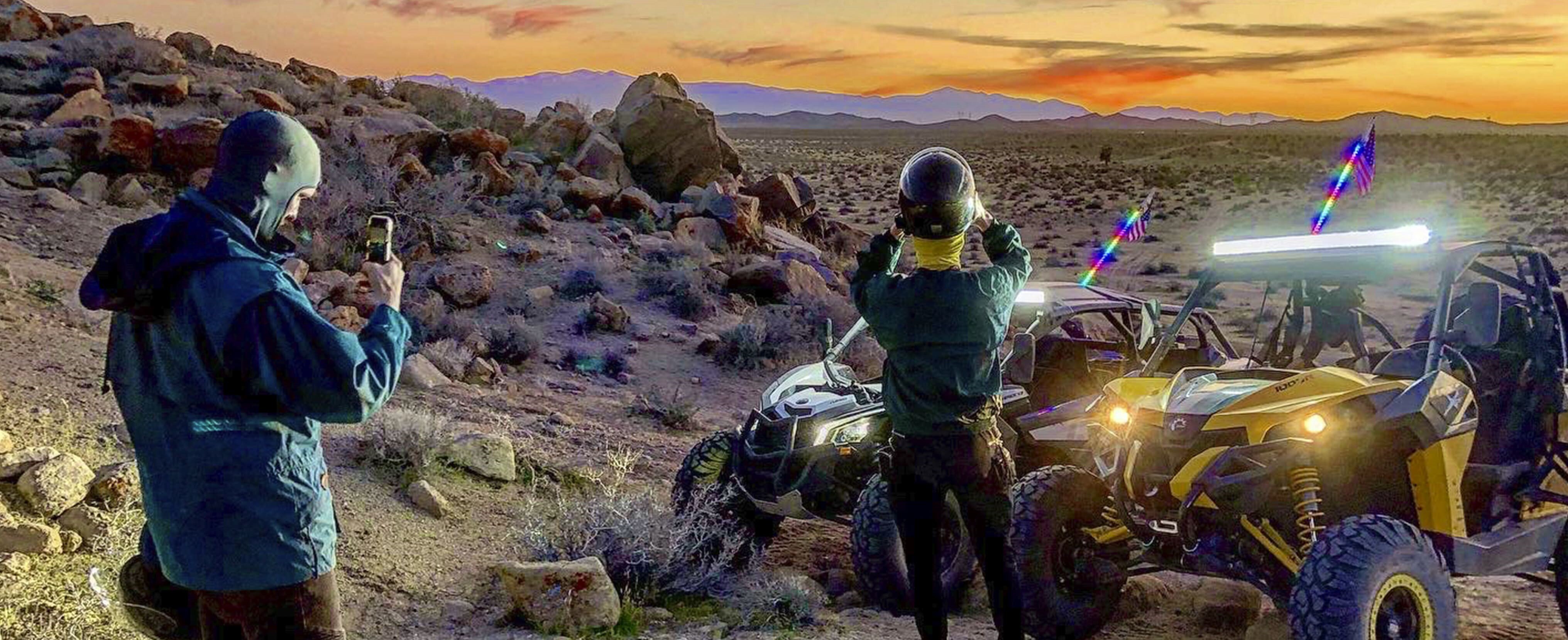 Can-Am riders looking at the sunset
