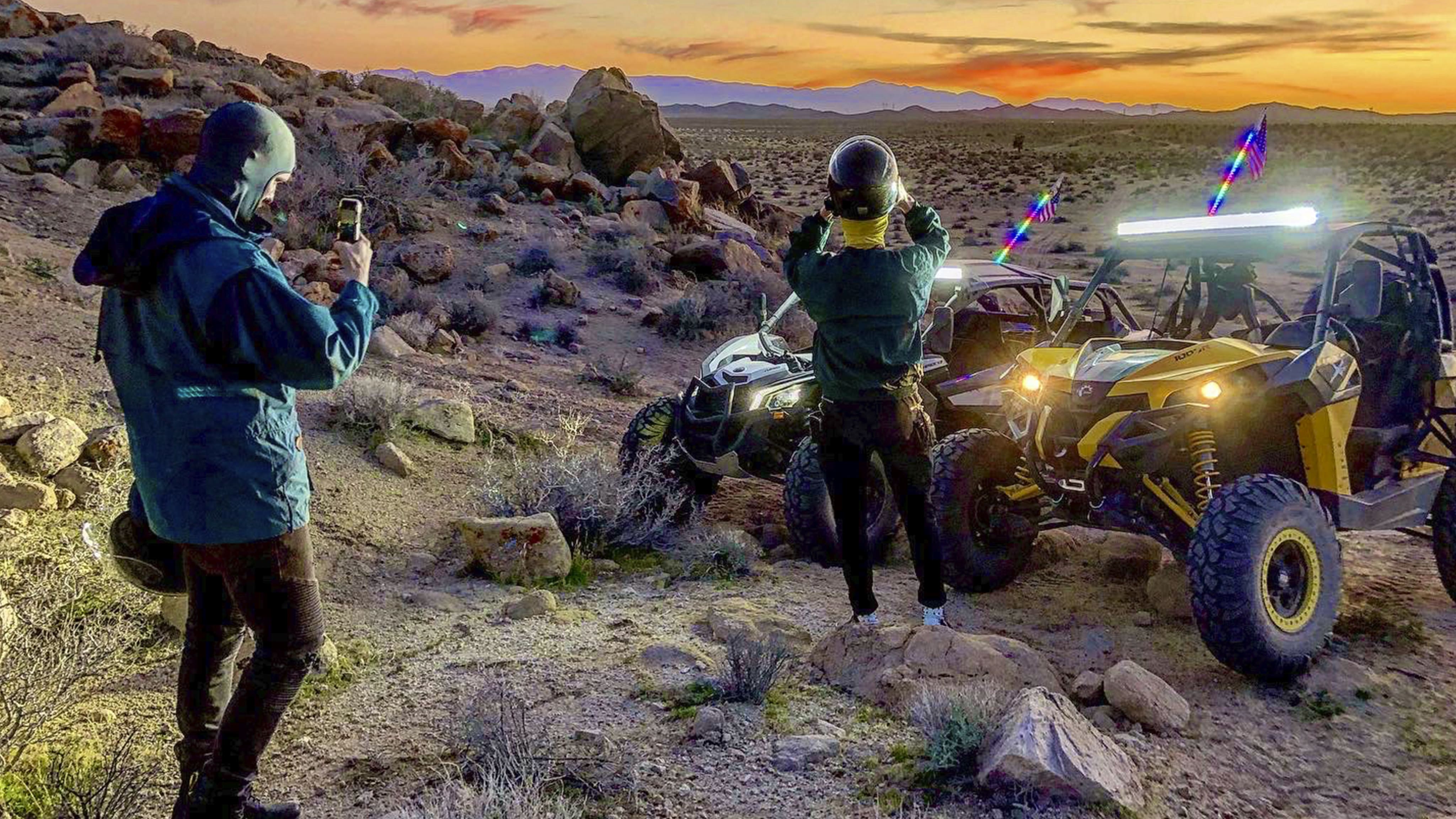 Can-Am riders looking at the sunset