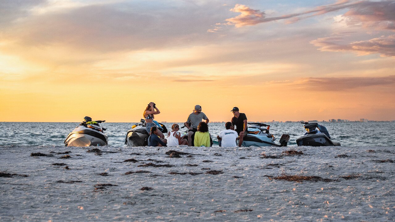 Group of riders on the beach